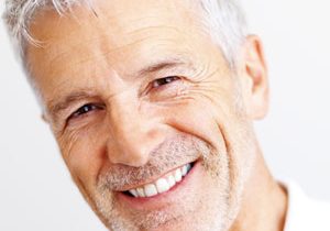 snap in dentures vs permanent dentures
