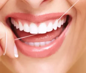 Dental Floss to clean the teeth