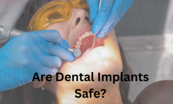 A dental professional reviews a dental implant, emphasizing its safety and effectiveness.