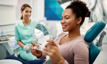 woman looking at her dental implants rockville md