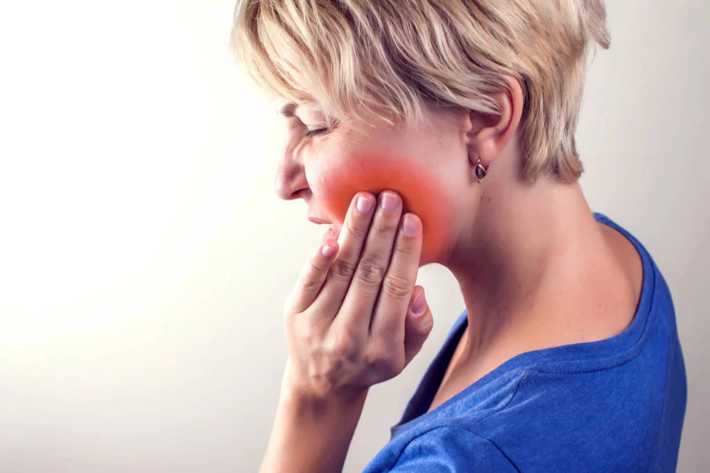 Girl experiencing pain needs a Dentist Rockville MD