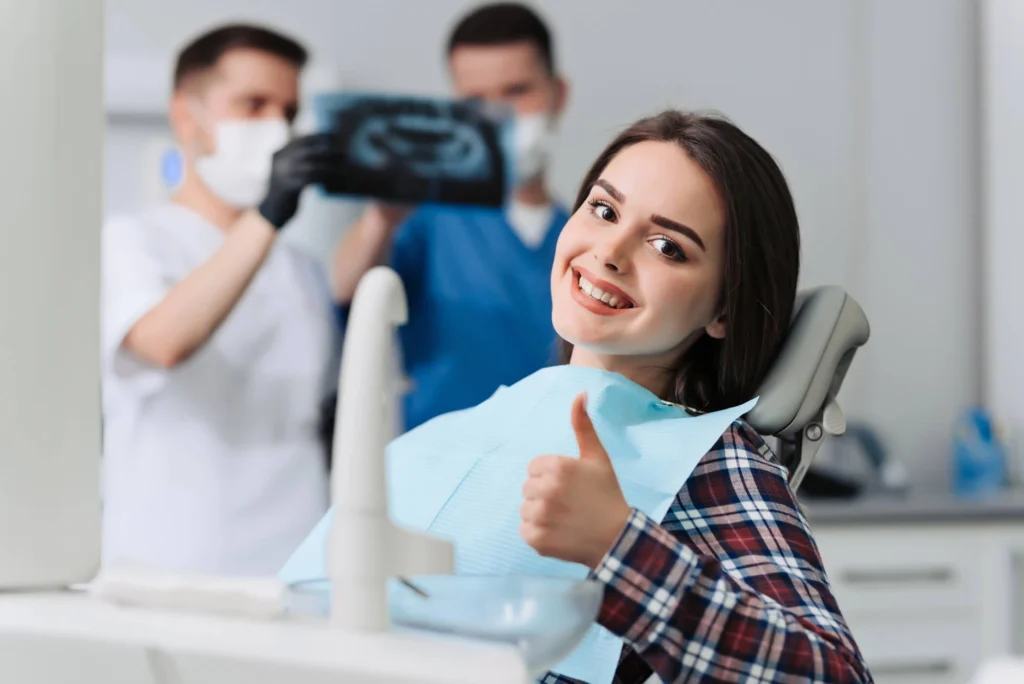 girl smiling after root canals rockville md