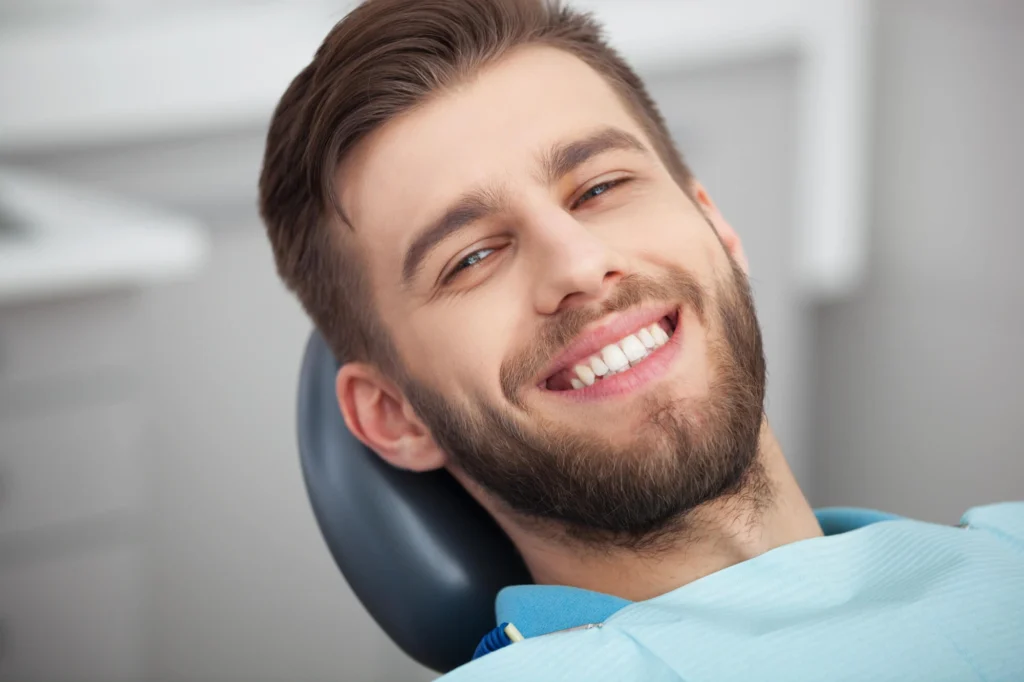 Man smiling with veneers rockville md
